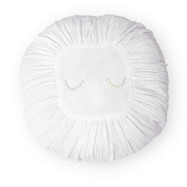 Coussin MueMue rond blanc avec détails brodés dorés pour salon ou chambre